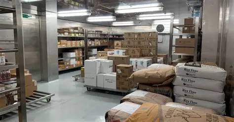 Bags of Dried Rice Stored on a Shelf in a Dry Area of the Storeroom
