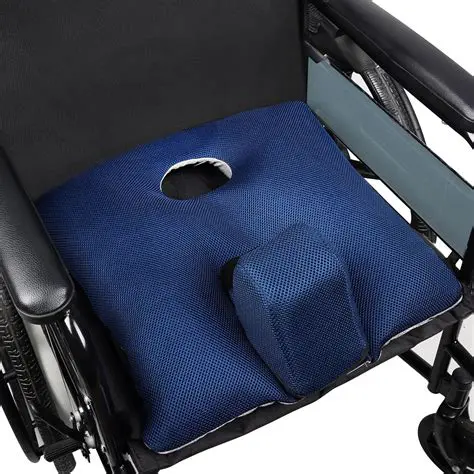 Pommel Cushions for Wheelchair Positioning for a Resident Who is Totally Dependent on Staff